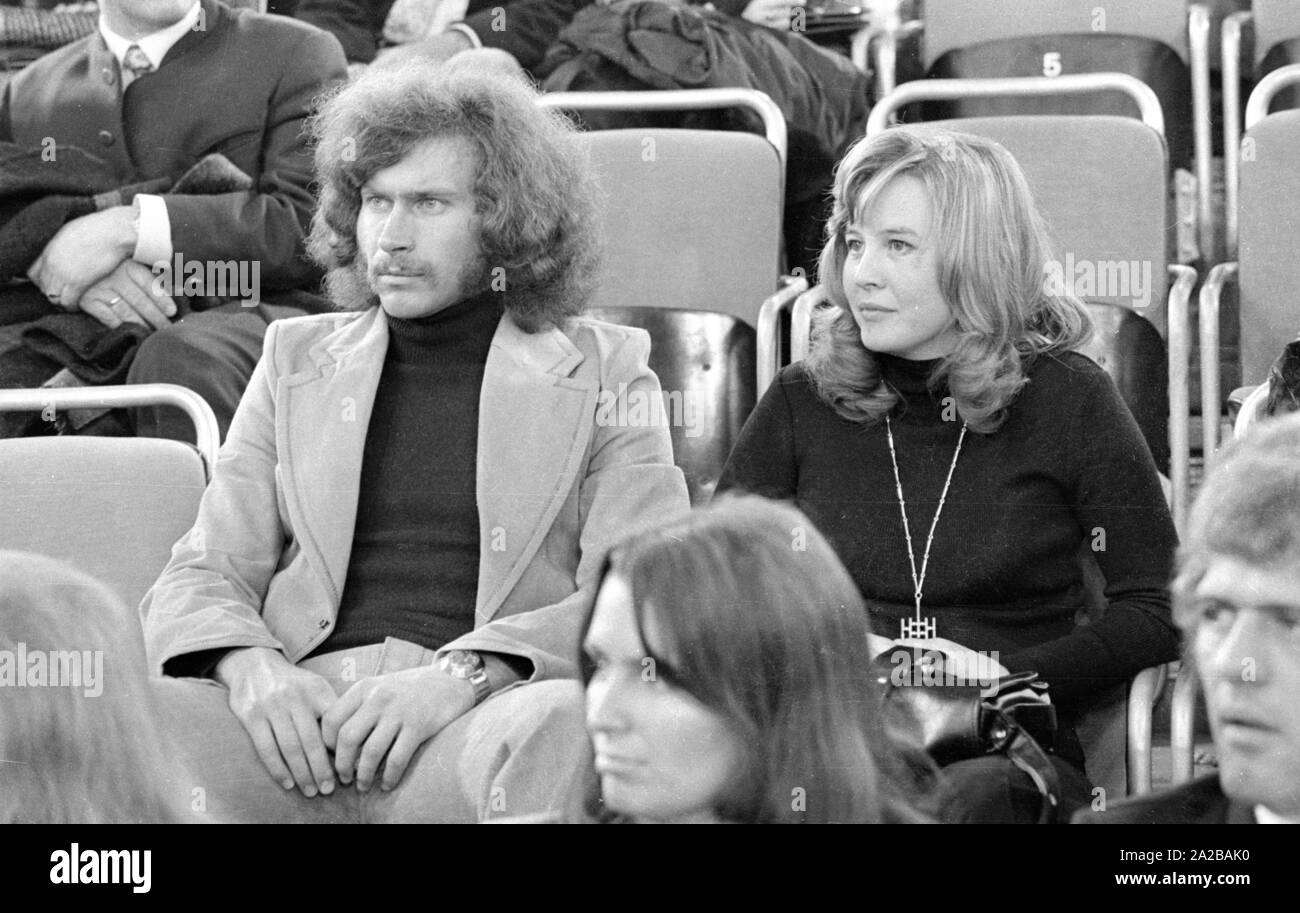 Footballer Paul Breitner sitting in the stands at the Sportpressefest in the Munich Olympiahalle. Beside him, his wife Hilde Breitner. Stock Photo
