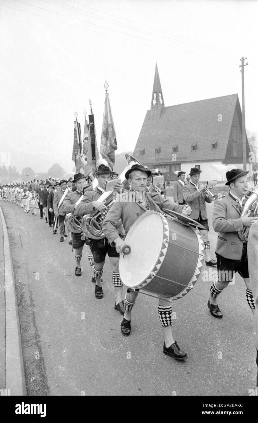 Marching band at a traditional costume parade in a Bavarian spa town. Stock Photo