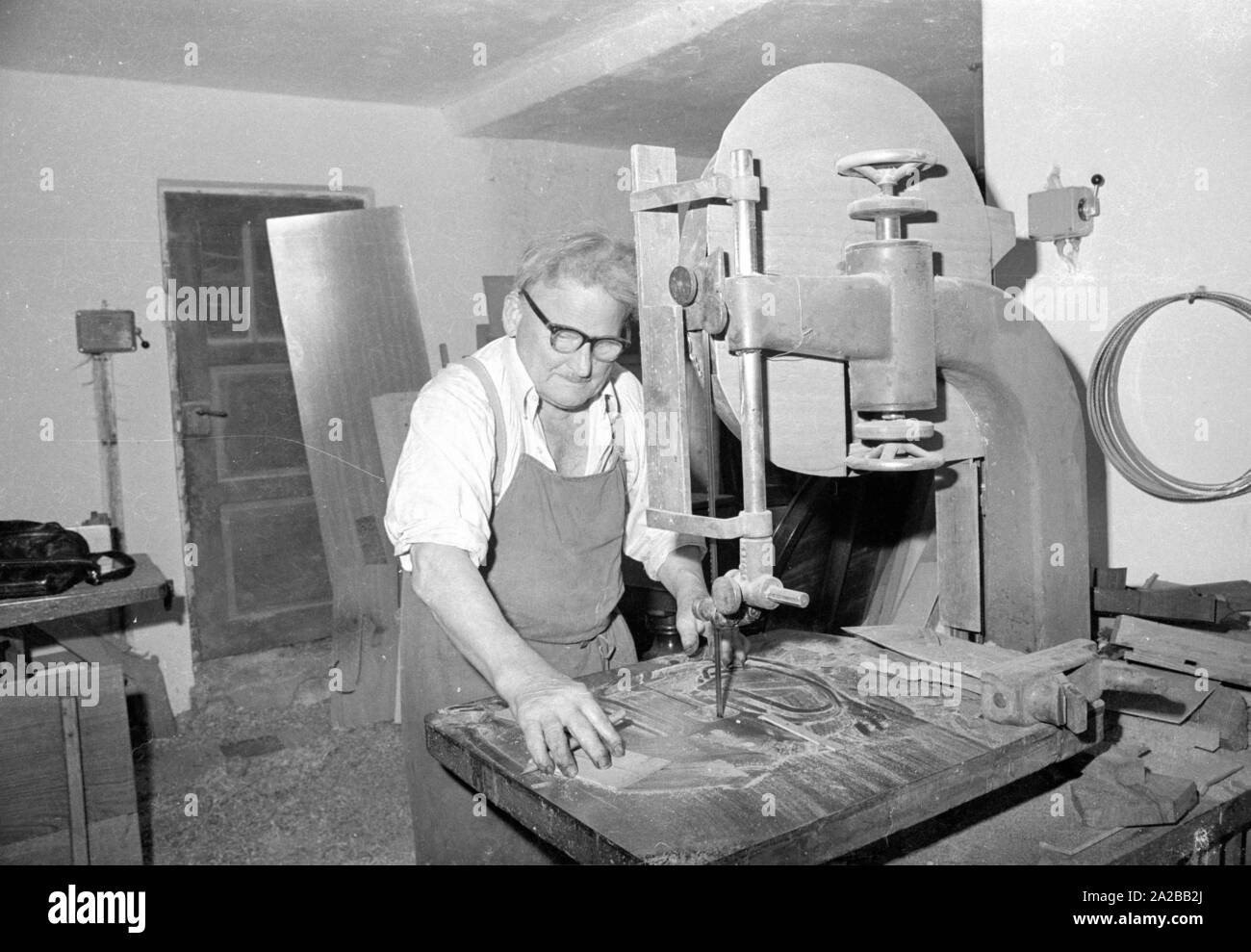 View into a joiner's the master joiner operates a machine