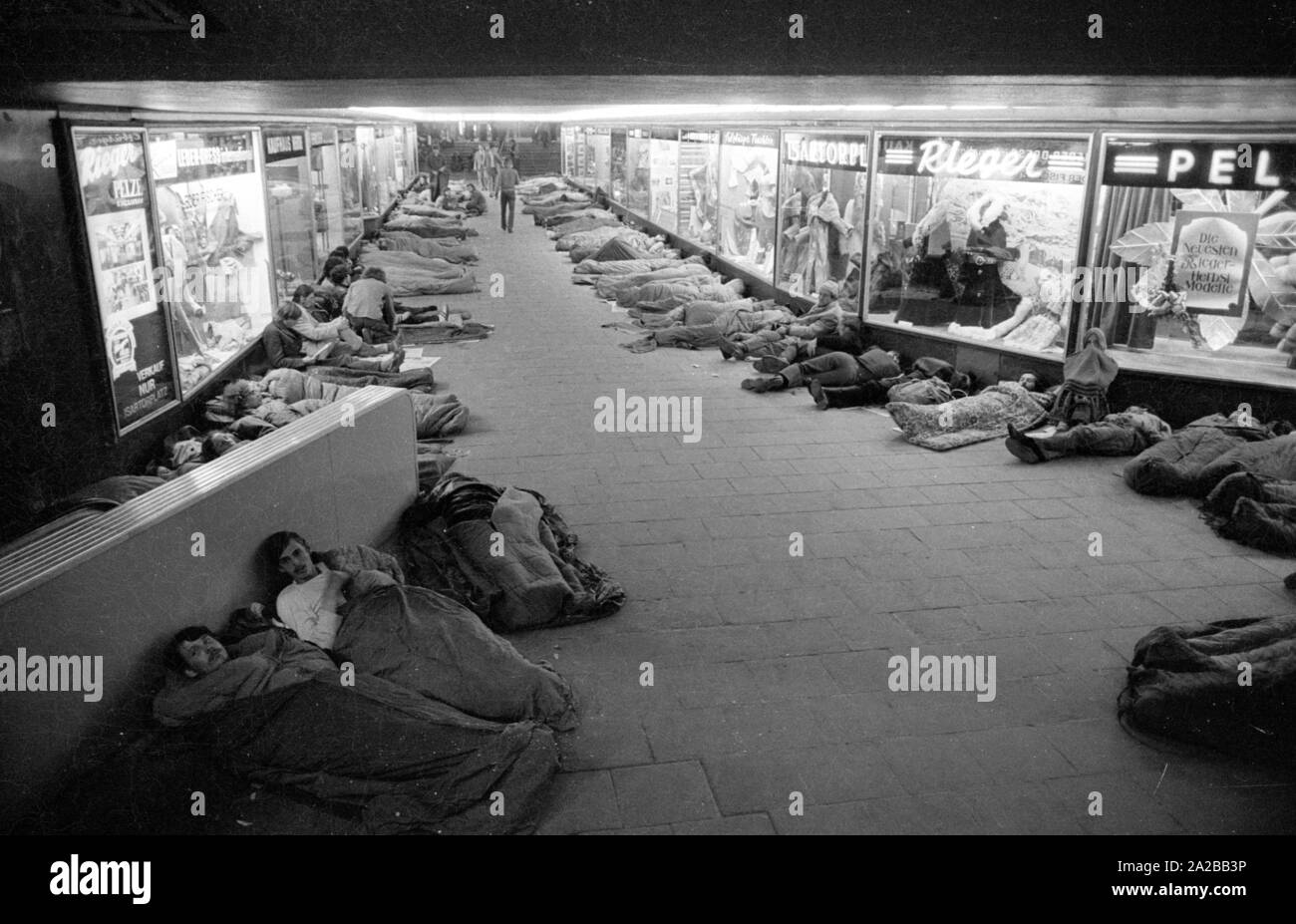 Homeless People Sleeping In The Mezzanine Floor At The Munich Main