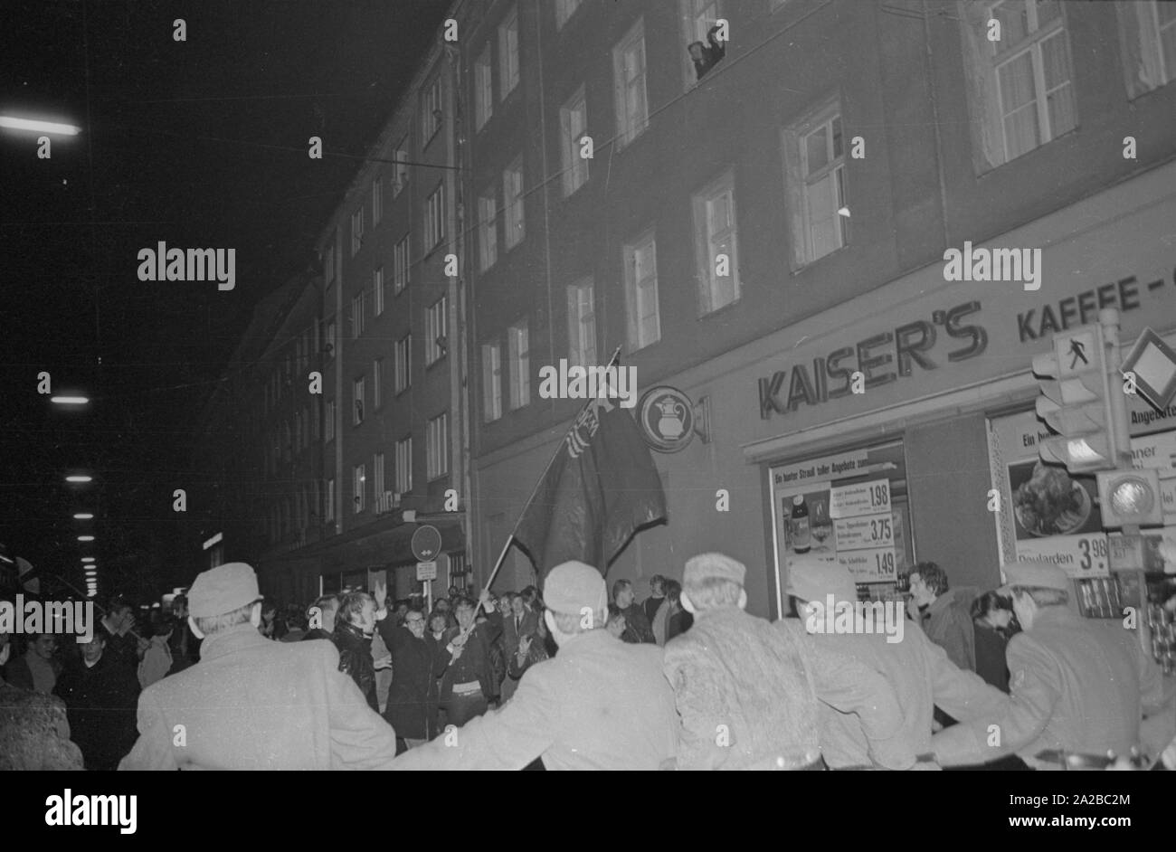 After the assassination attempt on Rudi Dutschke, actions took place against the Springer publishing house throughout Germany on the Easter weekend 1968. In Munich, demonstrators try to stop the delivery of the Bild-Zeitung through the barricade of the Munich bookshop on Schellingstrasse (either 12.04 or 15.04.). Pictured: The police form a chain against the demonstrators. Stock Photo