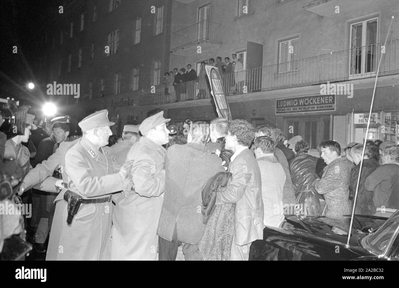 After the assassination attempt on Rudi Dutschke, actions took place against the Springer publishing house throughout Germany on the Easter weekend 1968. In Munich, demonstrators try to stop the delivery of the Bild-Zeitung through the barricade of the Munich bookshop on Schellingstrasse (either 12.04 or 15.04.).    Pictured: Melee between protesters and the police. Stock Photo