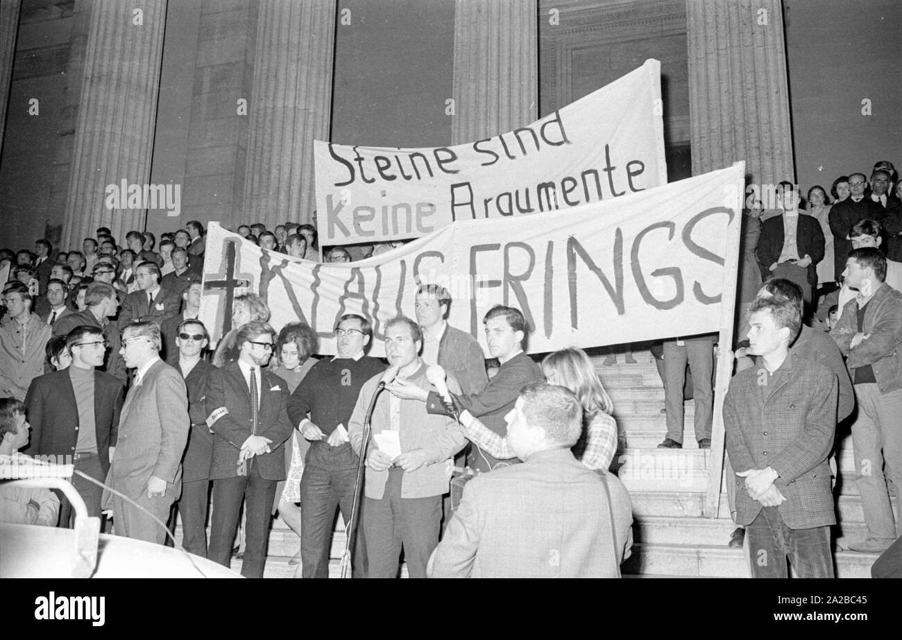 Following the assassination attempt on Rudi Dutschke, actions took place against the Springer publishing house throughout Germany on the Easter weekend 1968. In Munich, the street battles claimed two casualties, including press photographer Klaus Frings. On 17.04. (?) on Königsplatz was held the final rally of the silent march, organized by the General Students' Committee of the University. The posters read: 'Klaus Frings' and 'Stones are not arguments'. Stock Photo
