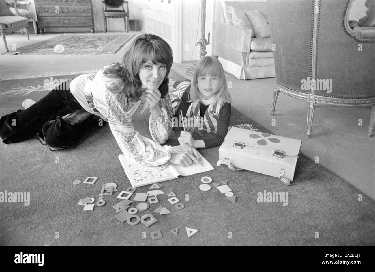 Petra Schürmann, a television presenter and actress, playing with her
