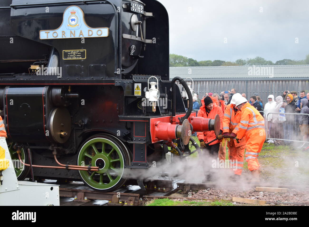 Volunteers turning Tornado steam engine on turntable at Ferryhill Railway Heritage Trust Aberdeen Stock Photo