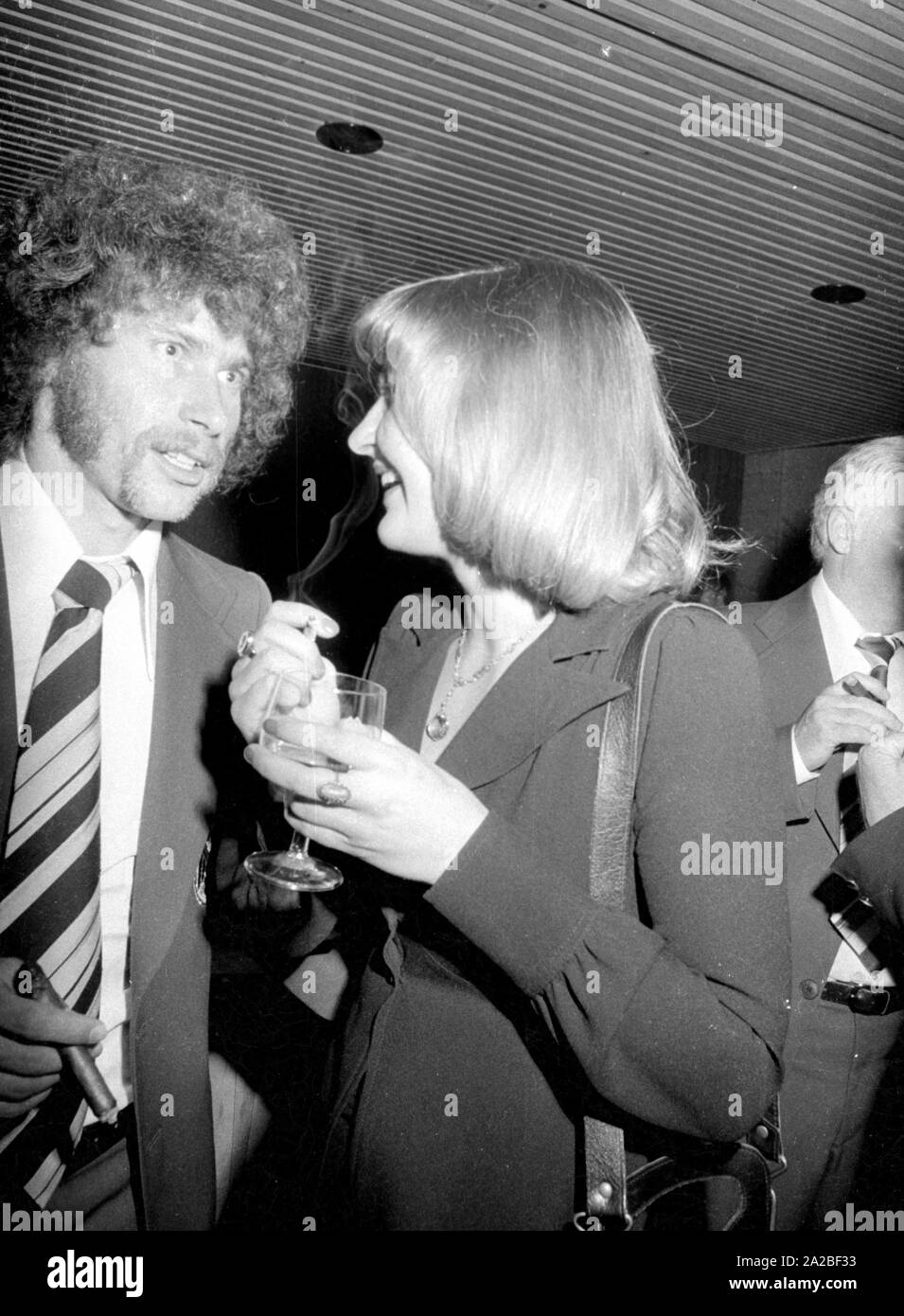 Footballer Paul Breitner and his wife Hilde (?) at the banquet of the Federal President at Hotel Hilton in Munich. Stock Photo