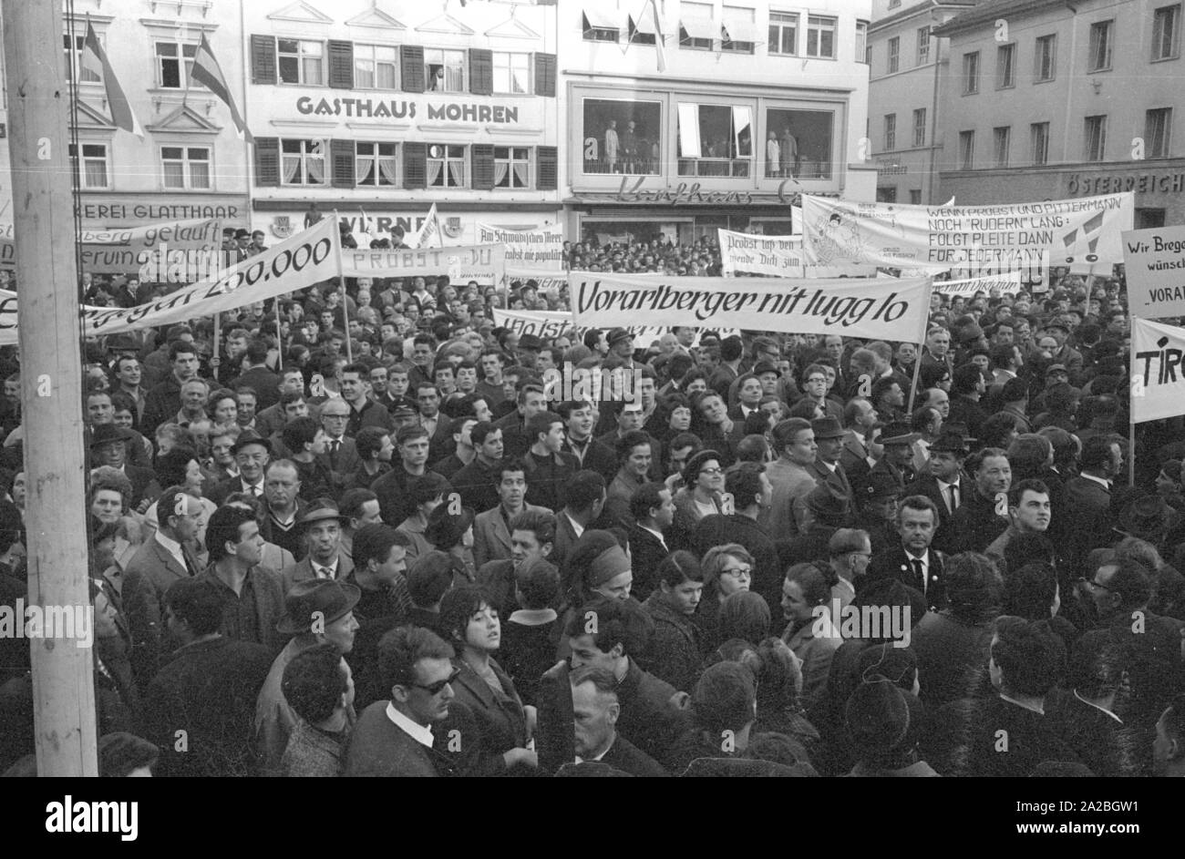 People demonstrate on the Kornmarktplatz in Bregenz, they want the newest ship of the Austrian Bodensee fleet to be named 'Vorarlberg'. The inhabitants of the homonymous federal state reject the ship name 'Karl Renner'.This public debate, which lasted from 1964 to 1965, went down in history as the 'Fussachaffaere' ('Fussach affair'). Stock Photo