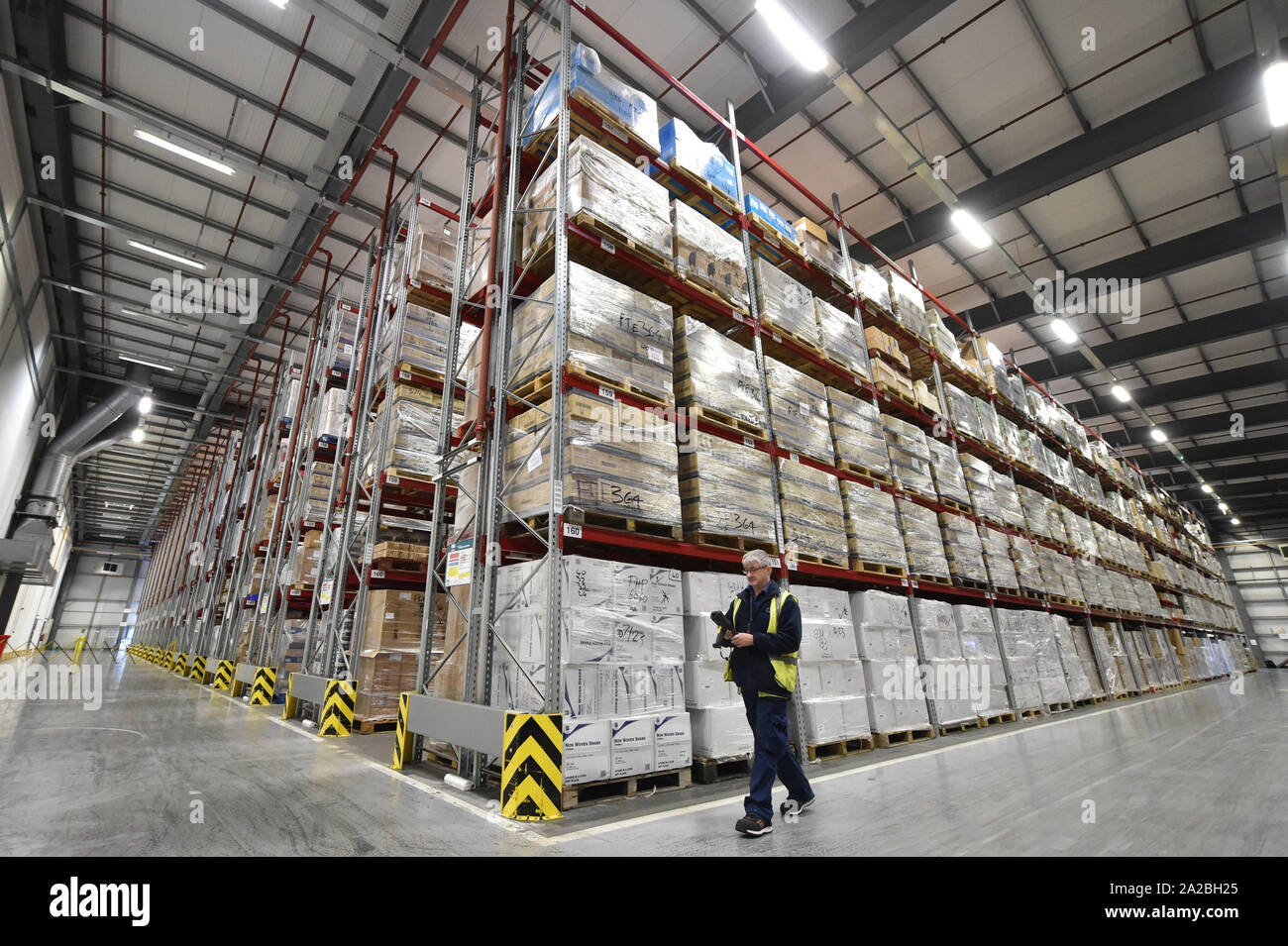 Warehouse huge racking pallets of medical supplies hi-res stock ...