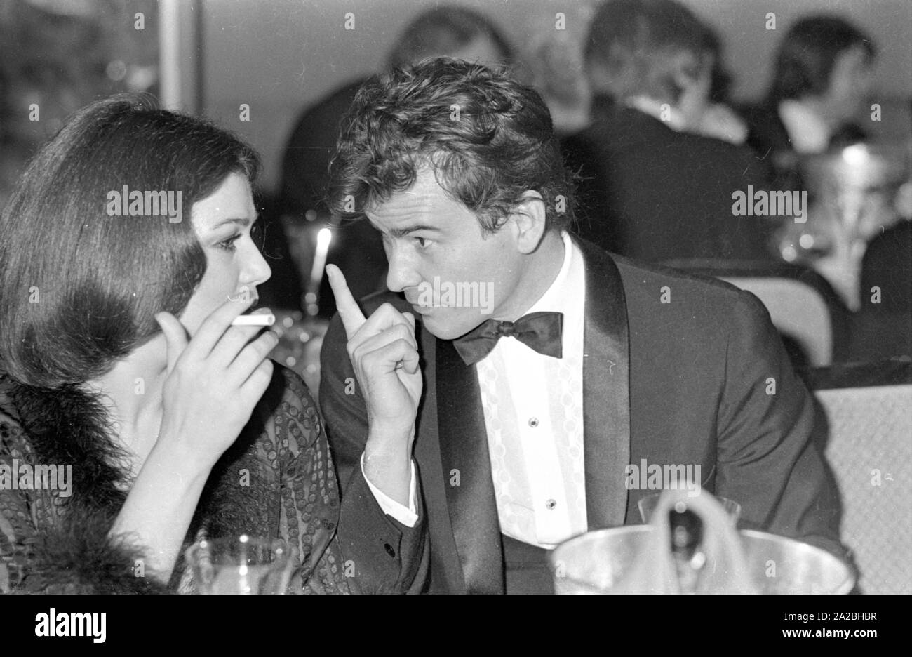 Hannelore Elsner and Horst Buchholz in conversation at the German Film Ball 1974 in the Bayerischer Hof. Stock Photo