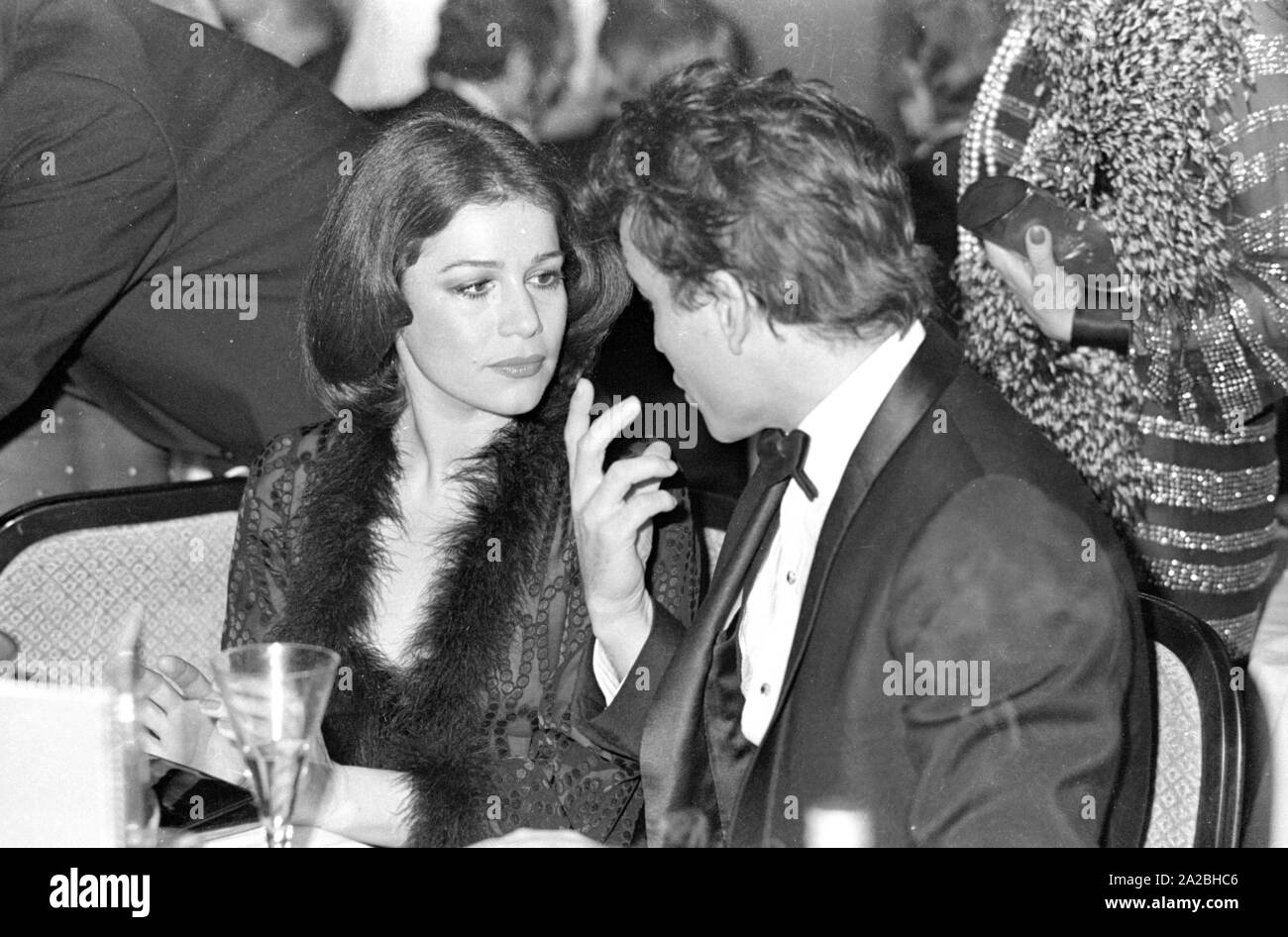 Hannelore Elsner and Horst Buchholz in conversation at the German Film Ball 1974 in the Bayerischer Hof. Stock Photo