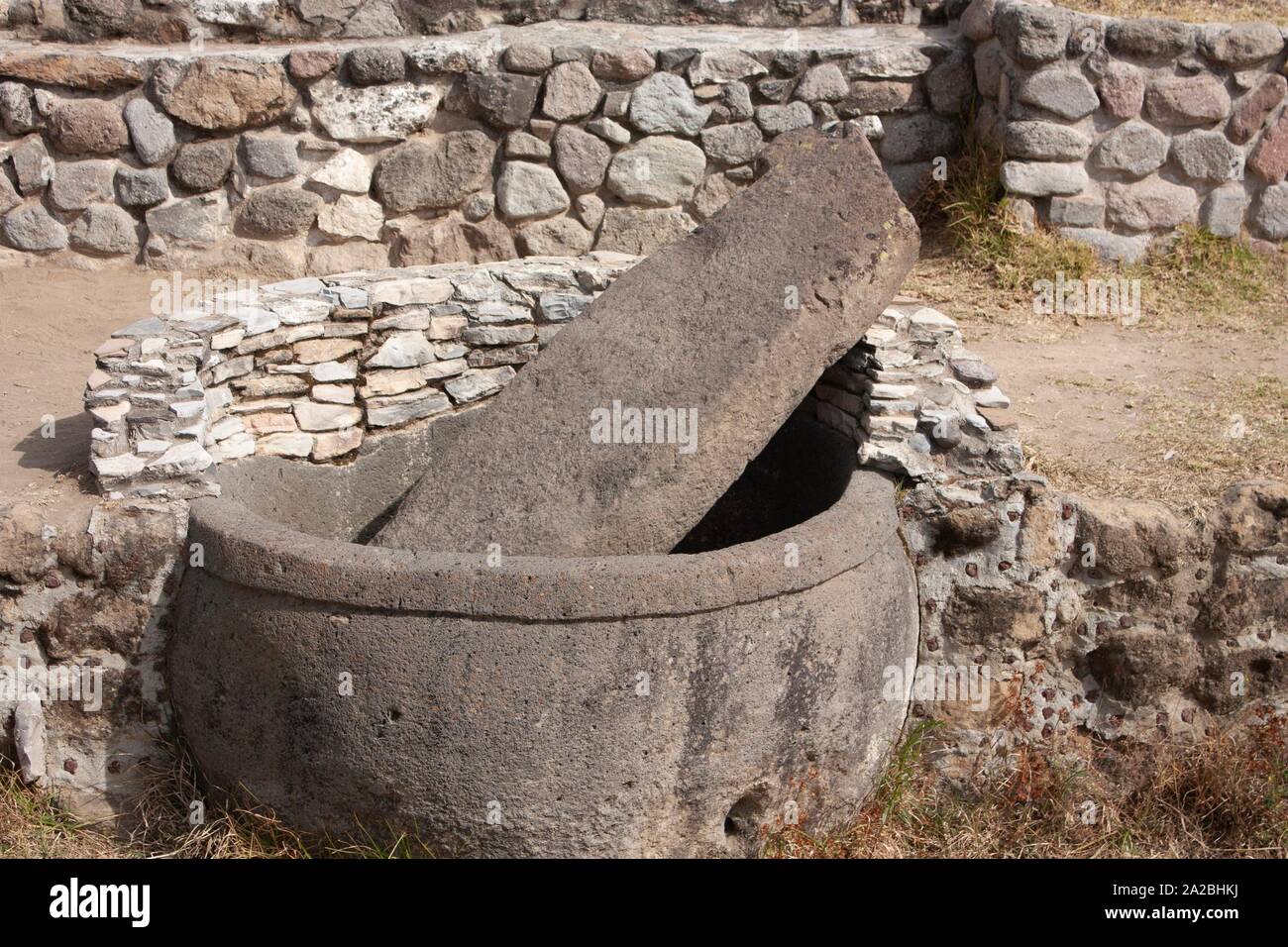 Stone tub for the shower built and carved by Mexican ancestors in Hidalgo state of Mexico photography with daylight. Stock Photo