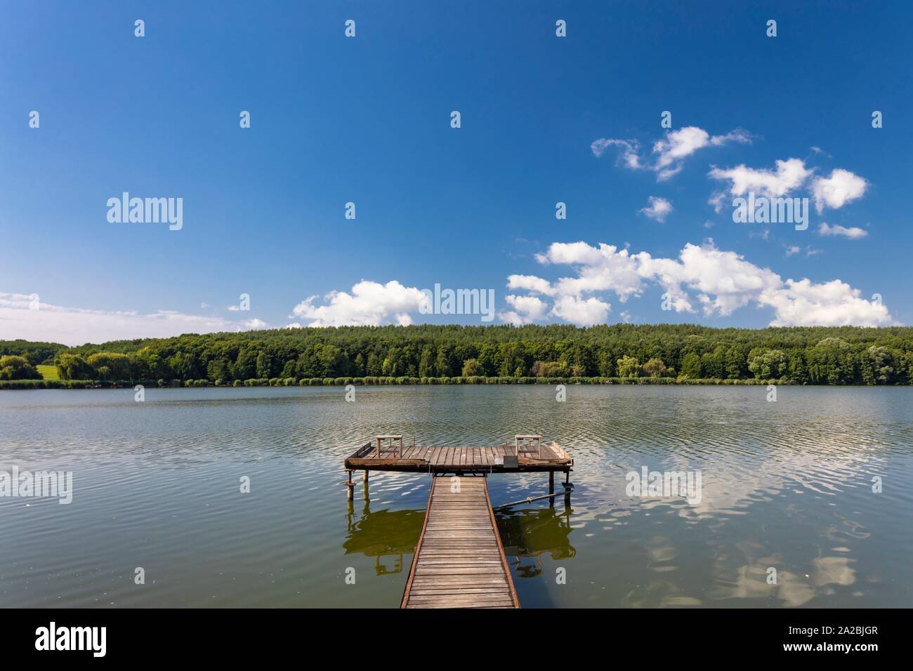 Pier on the pond Jenoi-to, Hungary. Stock Photo