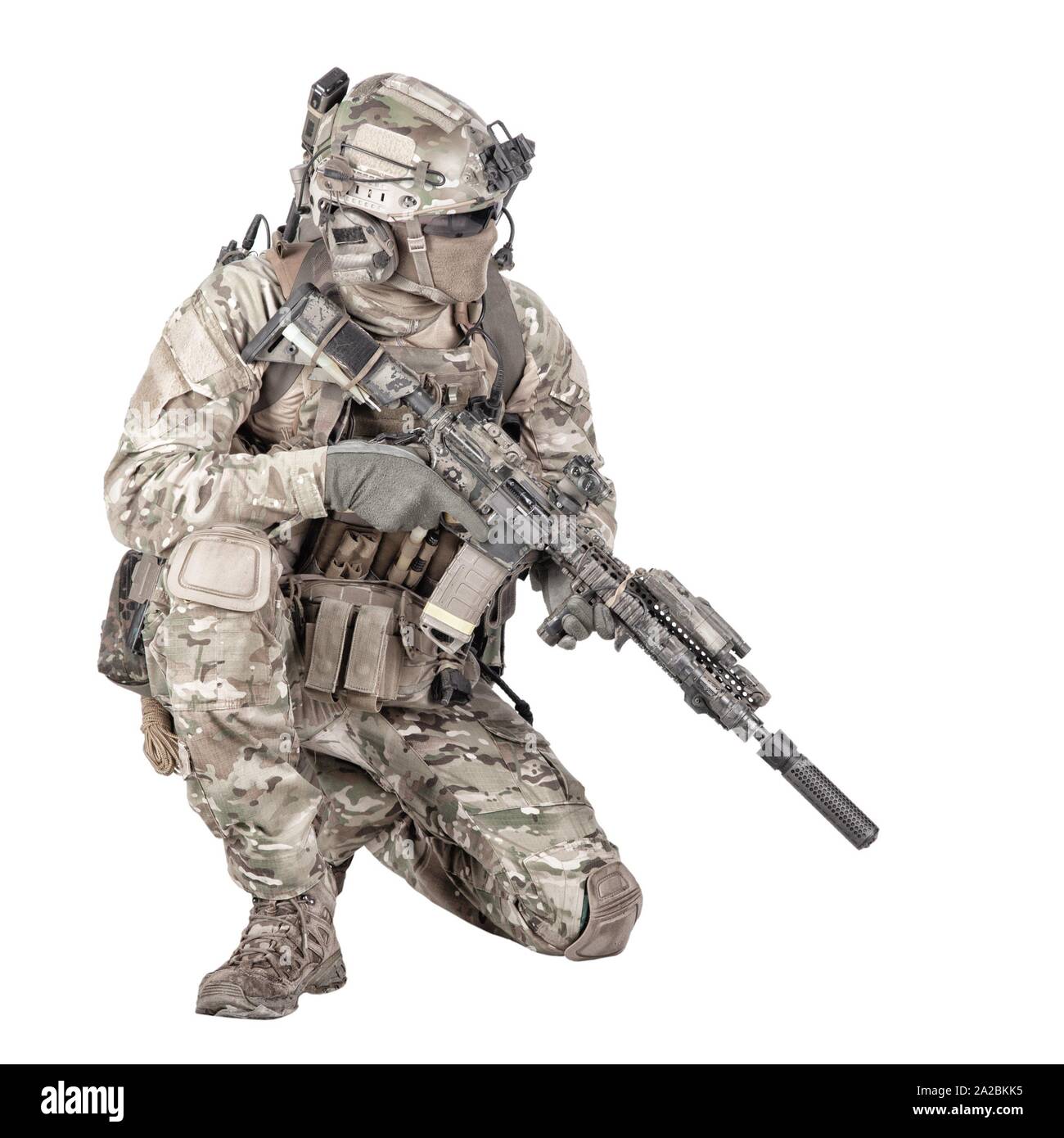 Army special forces infantry in battle uniform, radio headset on helmet