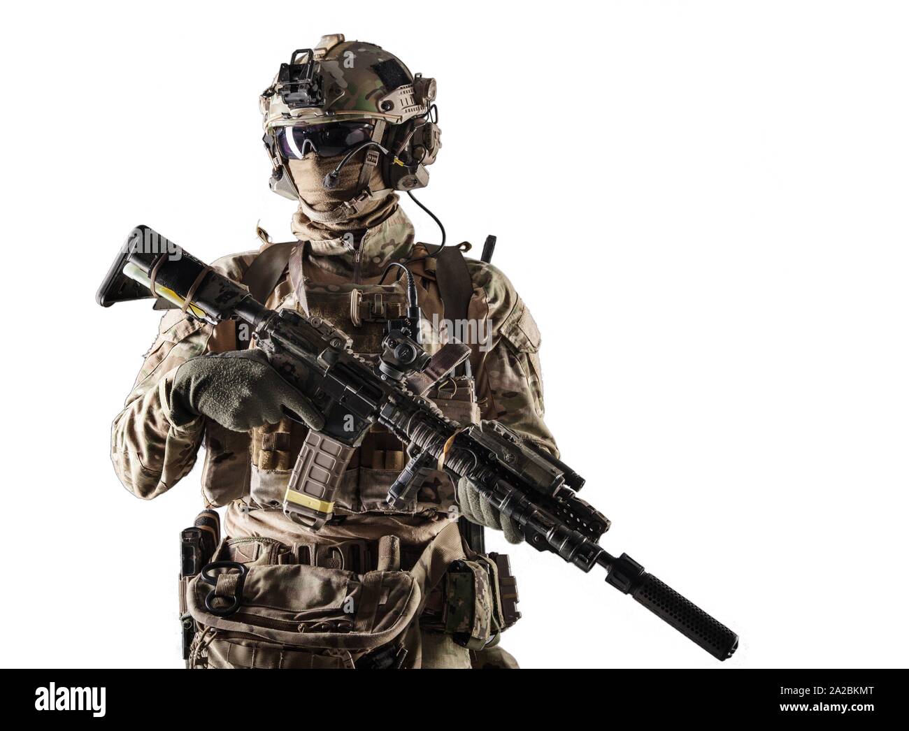 Special forces fighter in battle uniform and helmet with radio headset,  face mask and ballistic glasses, standing with equipped laser sight and  Stock Photo - Alamy