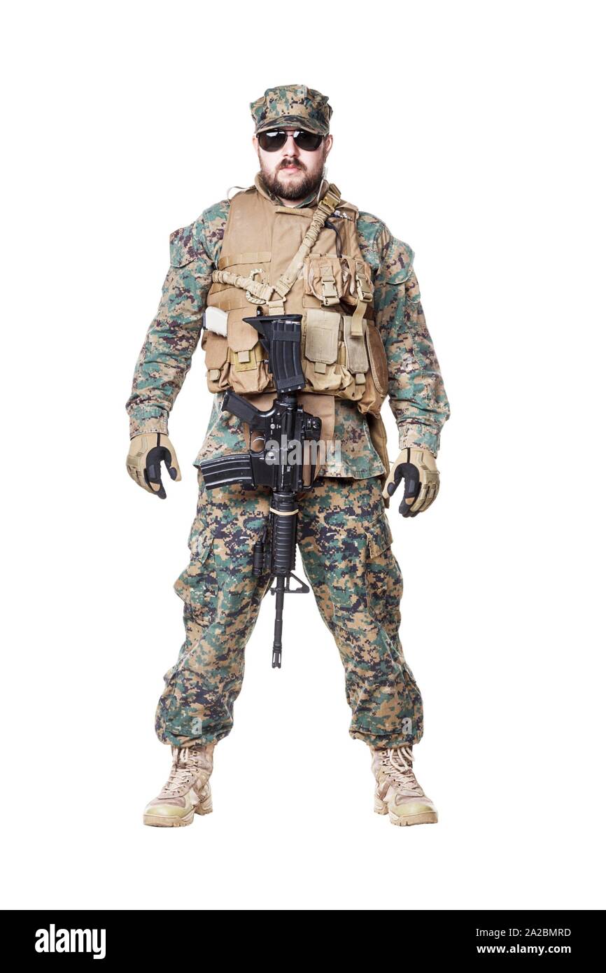 Studio shot of United States Marine with rifle weapons in uniforms
