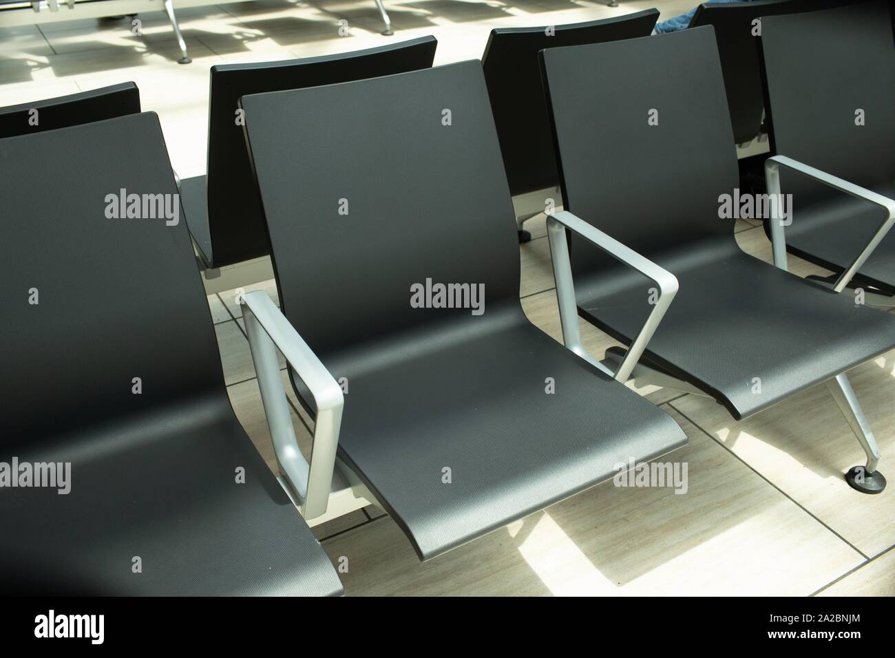 Empty chairs in an airport terminal. Stock Photo