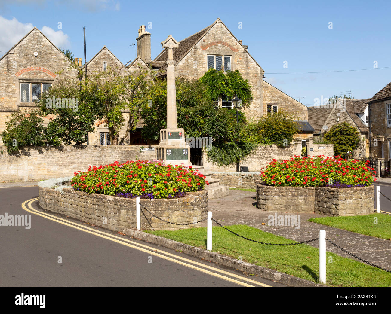 Historic Cotswold stone buildings and war memorial in Canon Square, Melksham, Wiltshire, England, UK Stock Photo