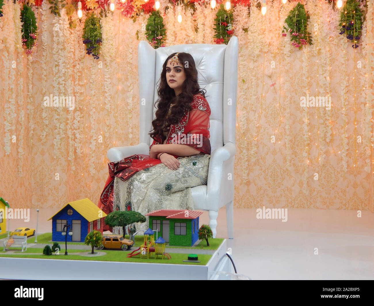 pix Girls Pose For Photoshoot With Lehenga https www alamy com a pretty independent fashionable girl model gave a stunning pose wearing a white and red colored lehenga image328488781 html