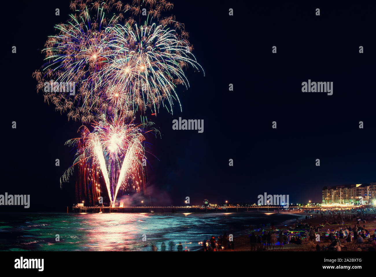Traditional New Year fireworks display from Glenelg jetty, South Australia Stock Photo