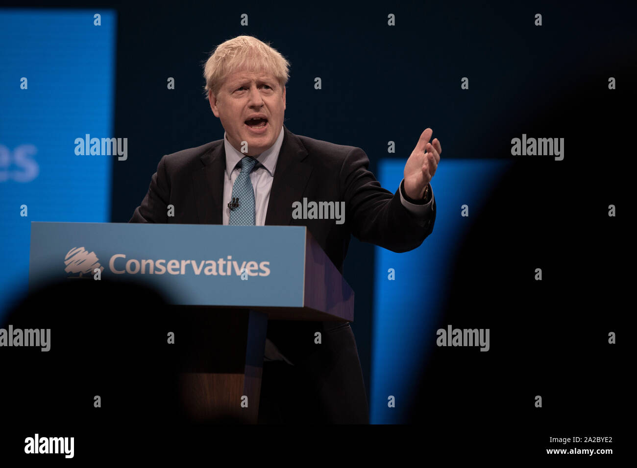 The Rt. Hon. Boris Johnson MP, leader of the Conservative Party and Prime Minister of the United Kingdom, delivering his keynote speech to the annual party conference in Manchester. The speech focused on a core message of delivering Brexit and honouring the result of the 2016 European referendum. The United Kingdom was due to leave the European Union on the 31st October, 2019. Stock Photo