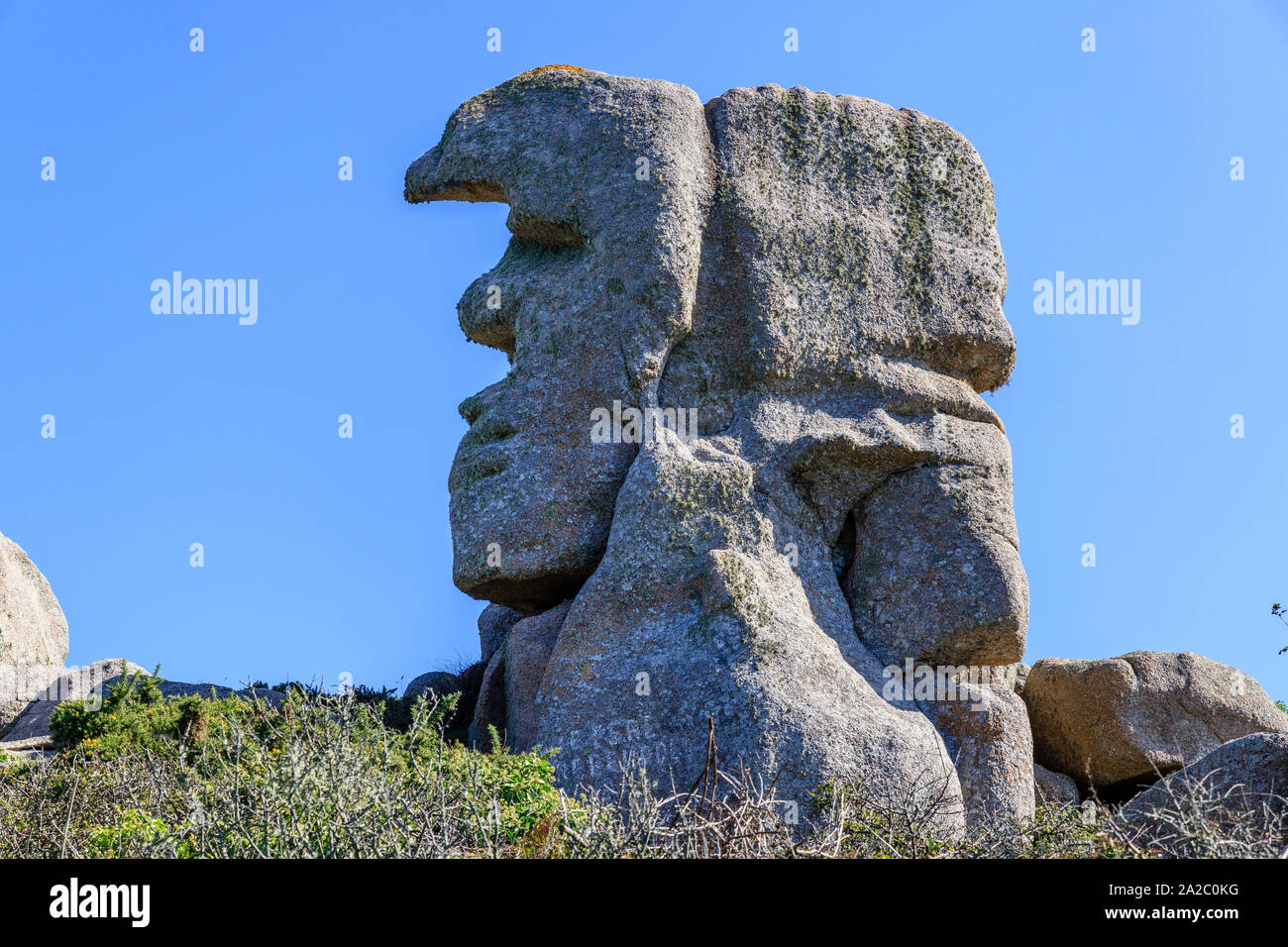 France, Cotes d'Armor, Cote de granit rose (Pink Granite Coast), Trebeurden, granitic rock of Pere Trebeurden located on the promontory of the Pointe Stock Photo