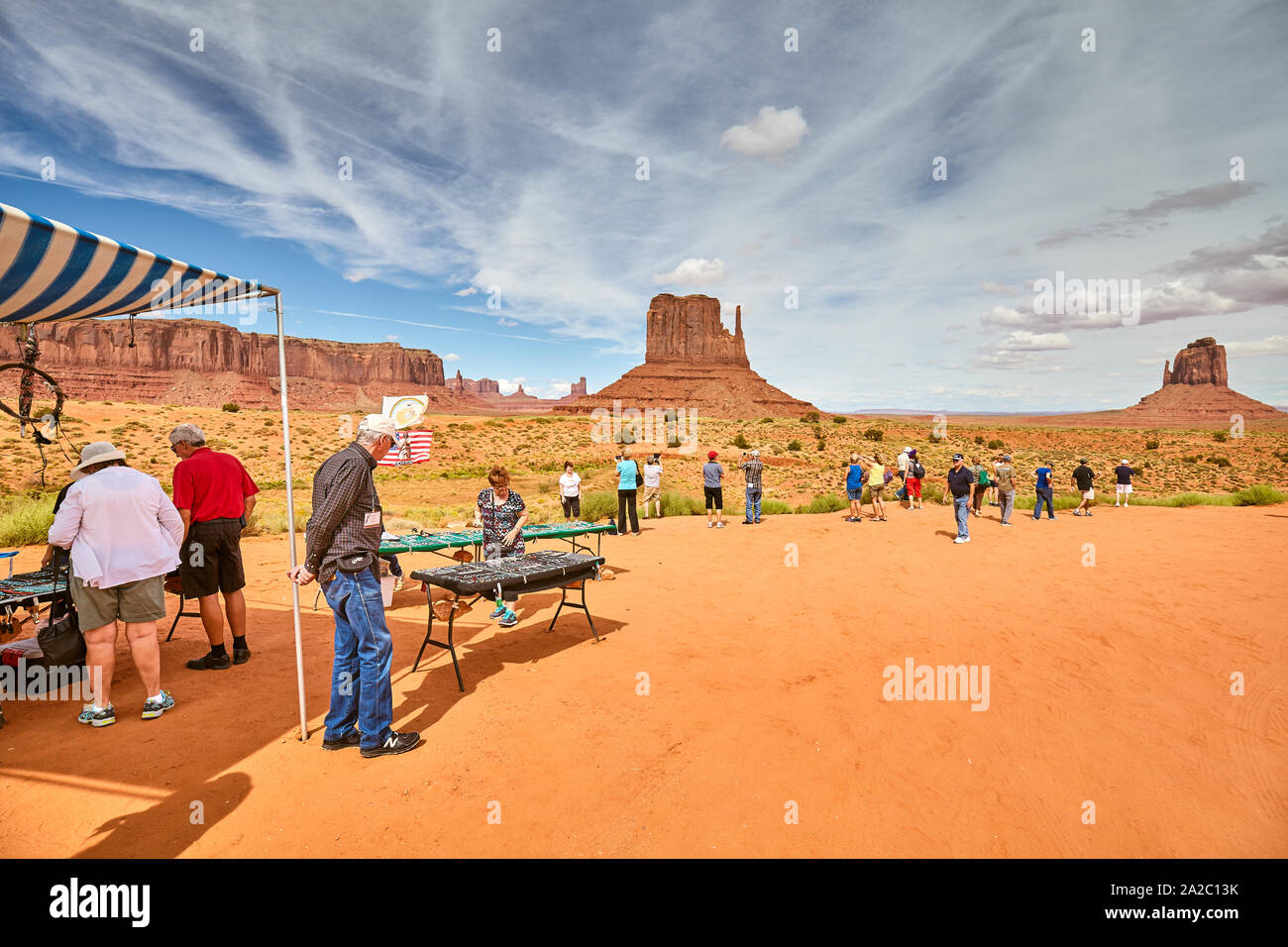 Utah, USA - September 07, 2015: Tourists at Navajo souvenir stall with Native American handcraft in Monument Valley. Stock Photo