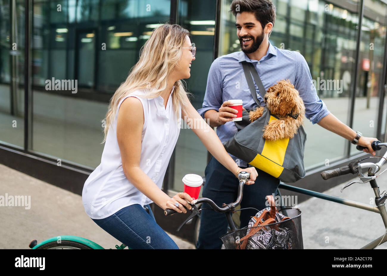 Couple in love with dog walking and smiling outdoor Stock Photo - Alamy