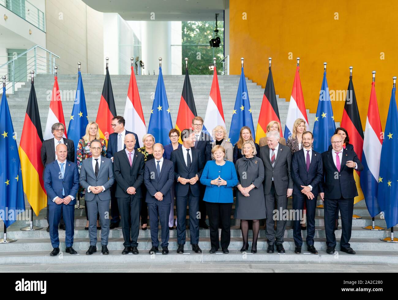02 October 2019, Berlin: Altmaier (CDU), Federal Minister of Economics and Energy, will be together for the family photo at the German-Dutch government consultations at the Federal Chancellery. Back row l-r: Dirk Brengelmann, German Ambassador to the Netherlands, Sigrid Kaag, Dutch Development Minister, Gerd Müller (CSU), Federal Minister for Economic Cooperation and Development, Ank Bijleveld, Dutch Defence Minister, Annegret Kramp-Karrenbauer (CDU), Federal Minister of Defence and CDU Chairwoman, Sander Dekker, Dutch Minister of Justice, Christine Lambrecht (SPD), Federal Minister of Justice Stock Photo