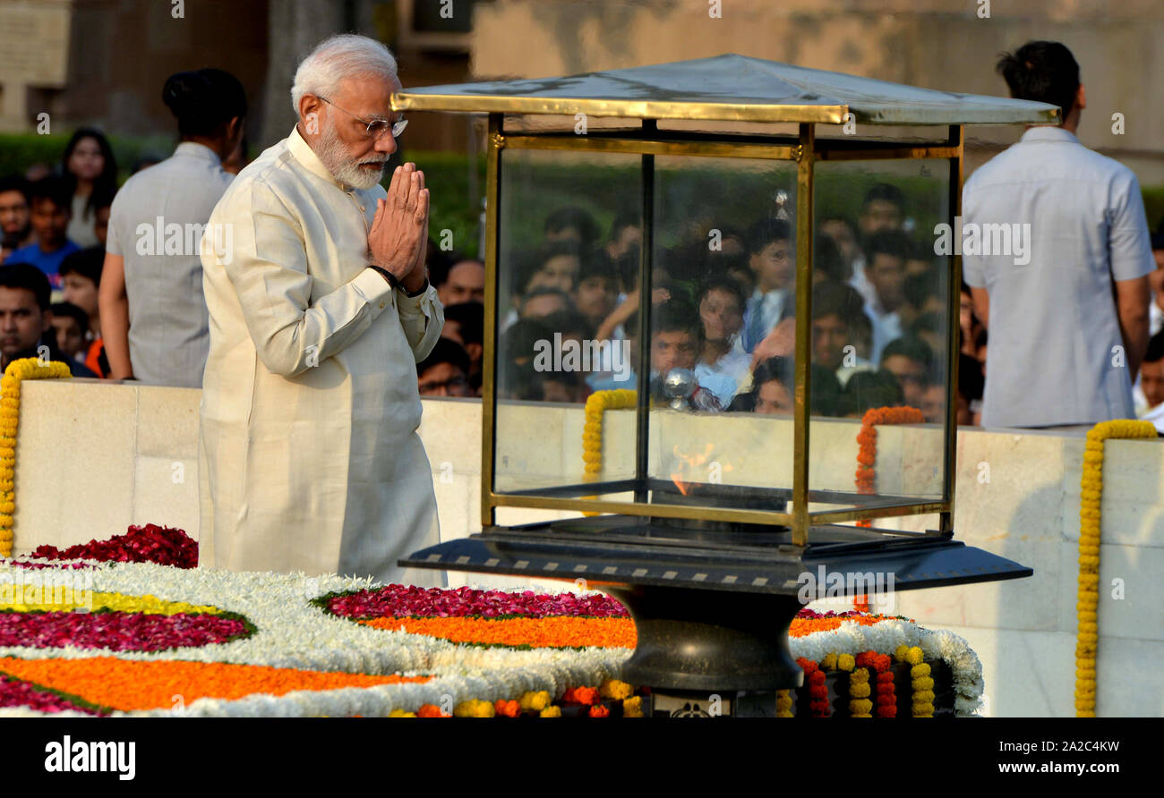 (191002) -- NEW DELHI, Oct. 2, 2019 (Xinhua) -- Indian Prime Minister Narendra Modi pays tribute at the event on the 150th birth anniversary of India's 'Father of the Nation' Mahatma Gandhi  in New Delhi, India, on Oct. 2, 2019. (Photo by Partha Sarkar/Xinhua) Stock Photo