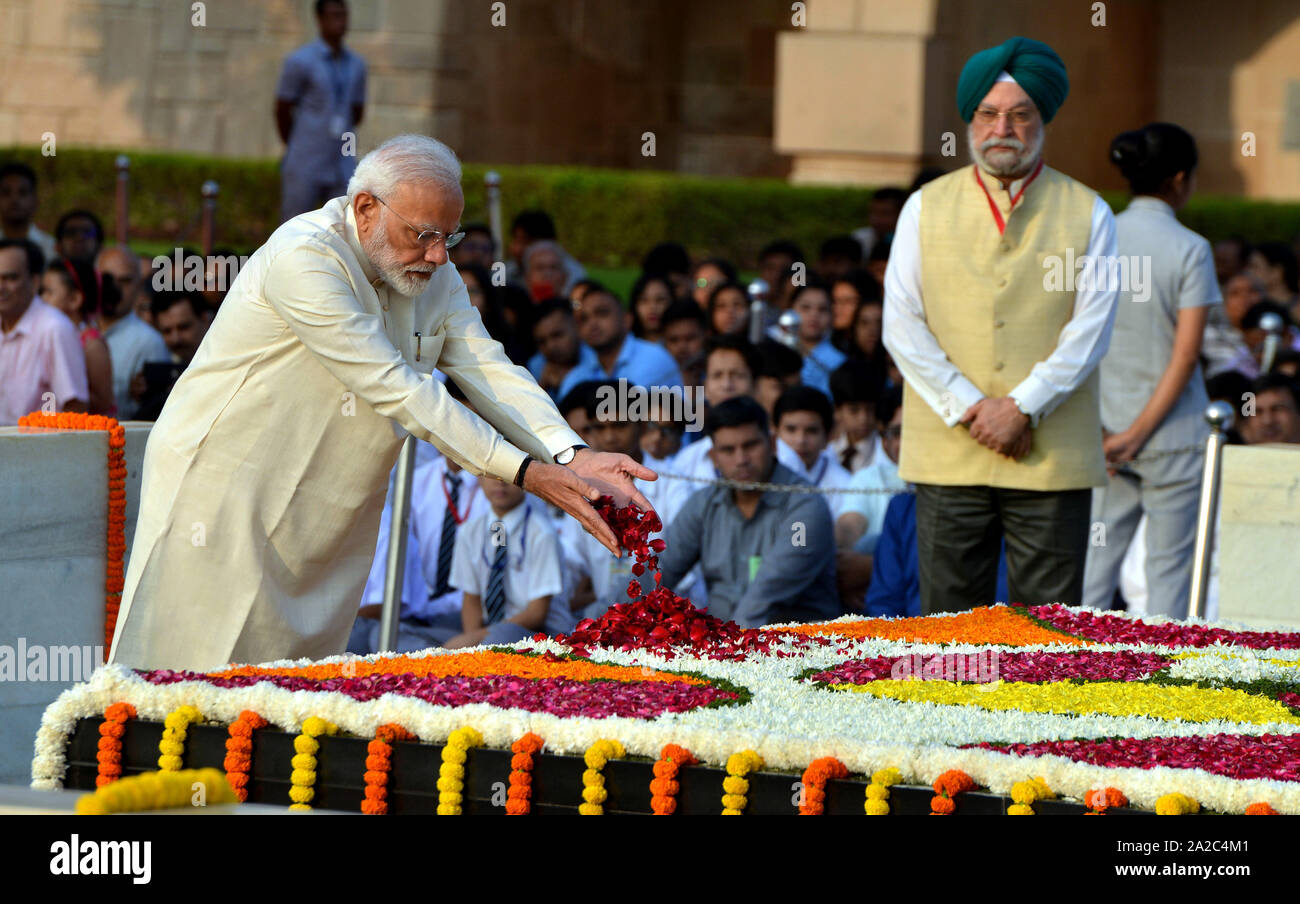 (191002) -- NEW DELHI, Oct. 2, 2019 (Xinhua) -- Indian Prime Minister Narendra Modi pays tribute at the event on the 150th birth anniversary of India's 'Father of the Nation' Mahatma Gandhi  in New Delhi, India, on Oct. 2, 2019. (Photo by Partha Sarkar/Xinhua) Stock Photo