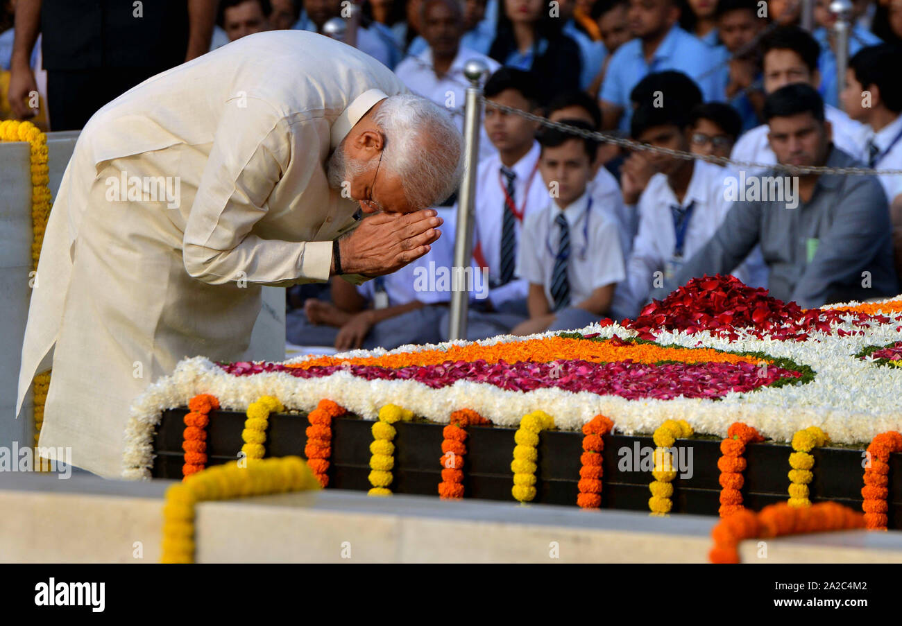 (191002) -- NEW DELHI, Oct. 2, 2019 (Xinhua) -- Indian Prime Minister Narendra Modi pays tribute at the event on the 150th birth anniversary of India's 'Father of the Nation' Mahatma Gandhi  in New Delhi, India, on Oct. 2, 2019. (Photo by Partha Sarkar/Xinhua) Stock Photo