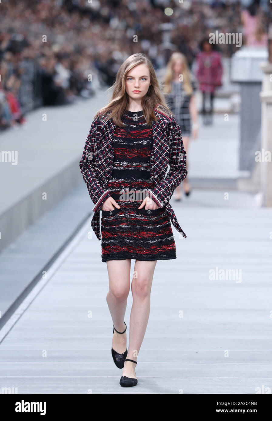 Paris, France. 1st Oct, 2019. A model presents creations of French fashion  house Chanel as part of its Spring/Summer 2020 women's ready-to-wear  collection show during Paris Fashion Week in Paris, France, Oct.