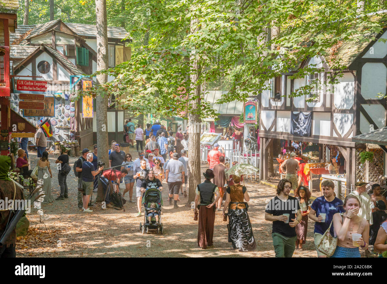 Visitors, some in costume, enjoy the bucolic setting at the annual