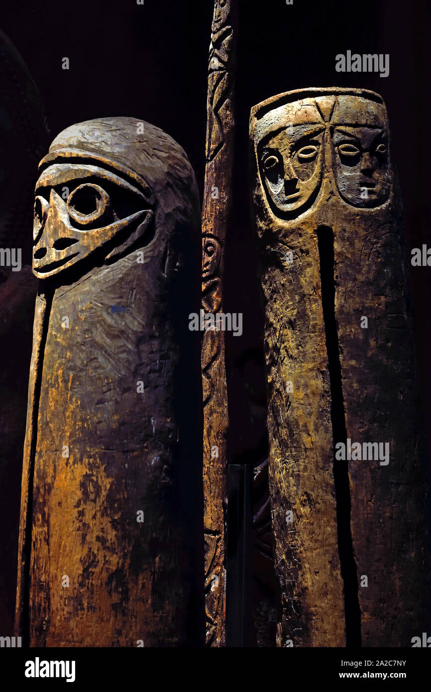 Slitwood Drum Musical Music  Instrument mid-20th century ( The stylized features of two faces are carved in low relief at the top end of the instrument.)  Oceania - Melanesia - Vanuatu - Malampa - Malekula (island) - Matanavat - Malua Bay Stock Photo