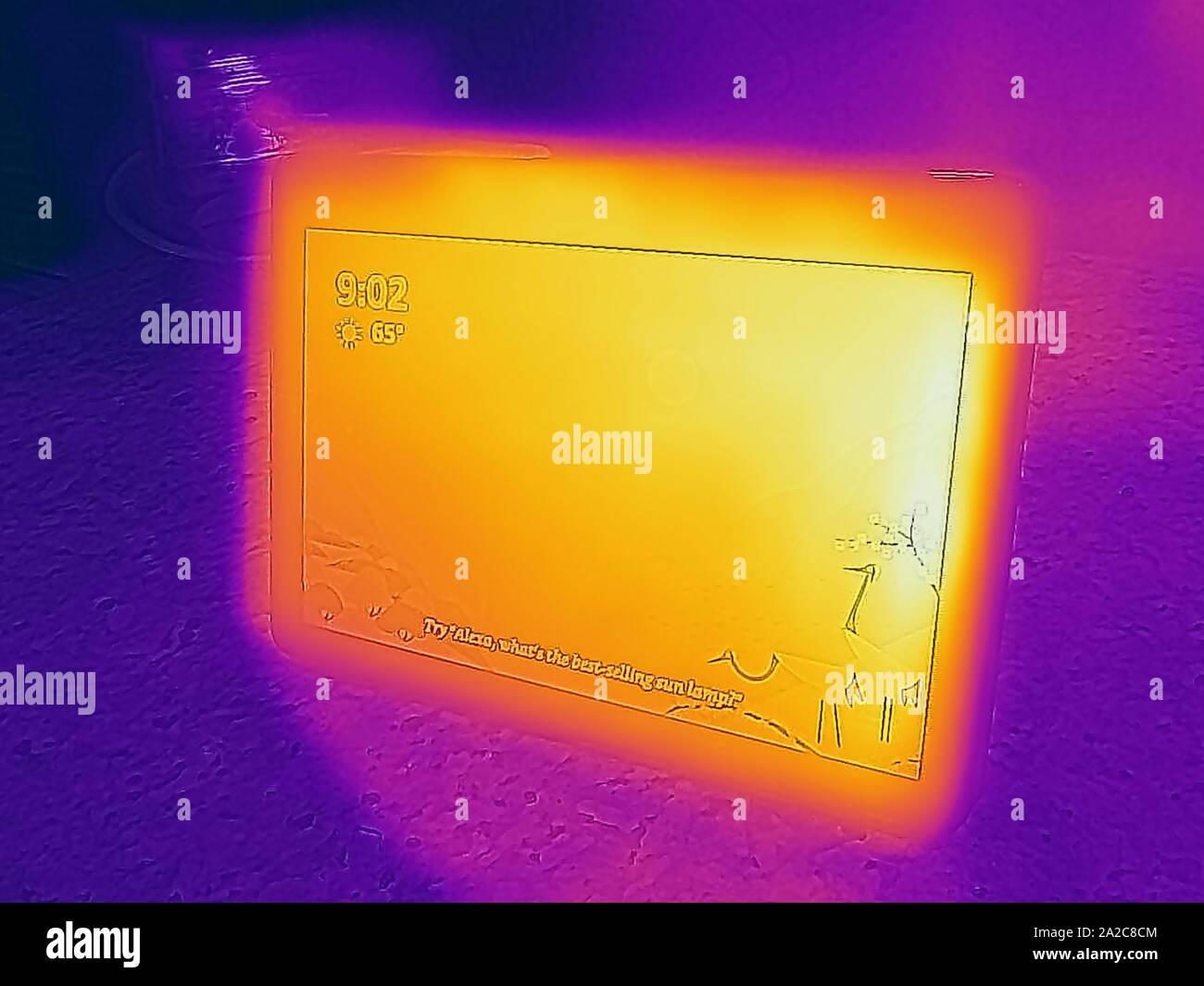 Thermal camera thermographic image, with light areas corresponding to higher temperatures, showing waste heat generated by Amazon Echo Show smart speaker, San Ramon, California, September 2, 2019. () Stock Photo