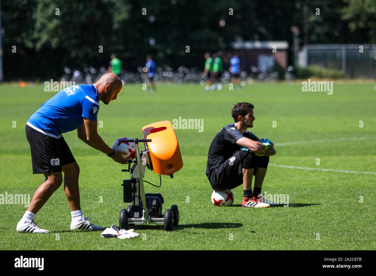 Goalkeeper throwing ball hires stock photography and images Alamy