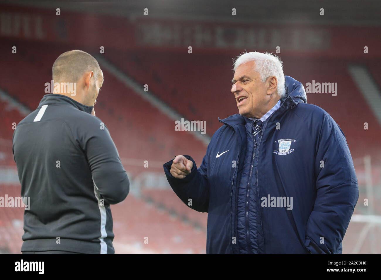 1st October 2019, Riverside Stadium, Middlesbrough, England; Sky Bet Championship, Middlesbrough v Preston North End : Alex Neil  manager of Preston North End and Peter Ridsdale advisor to Trevor Hemmings the owner at Preston North End chat on the pitch as they arrive at the Riverside    Credit: Mark Cosgrove/News Images Stock Photo