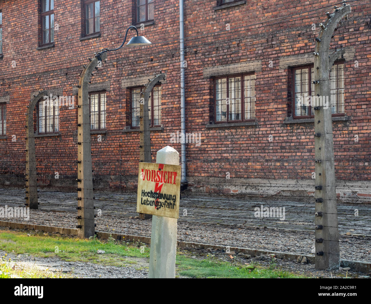 Electrified Fence at Auschwitz-Birkenau Concentration Camp, Poland Stock Photo
