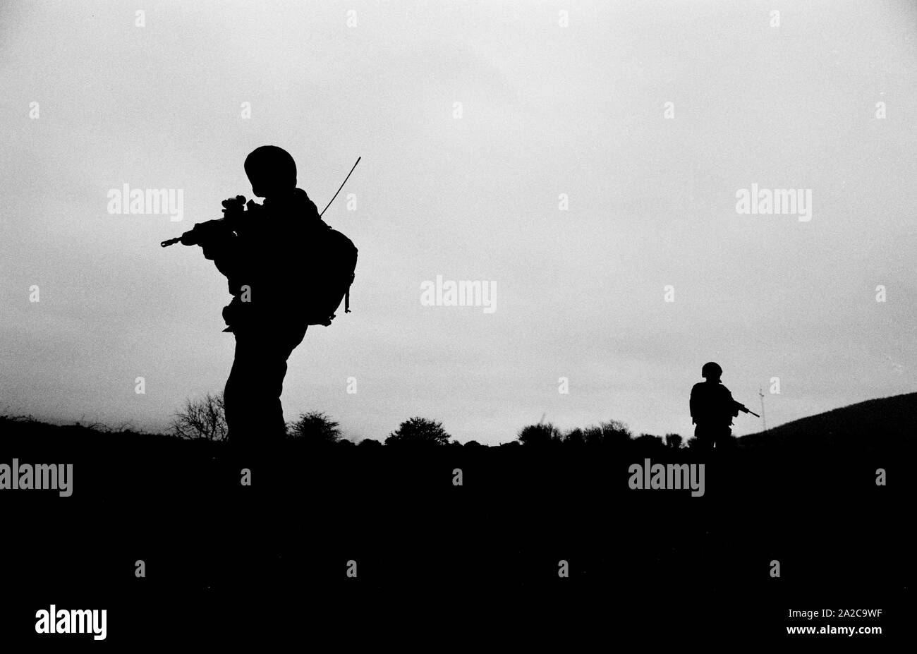 Soldiers from the Royal Scots (the Royal Regiment) army regiment, on patrol in Forkhill, South Armagh, Northern Ireland, in December 1992. Stock Photo