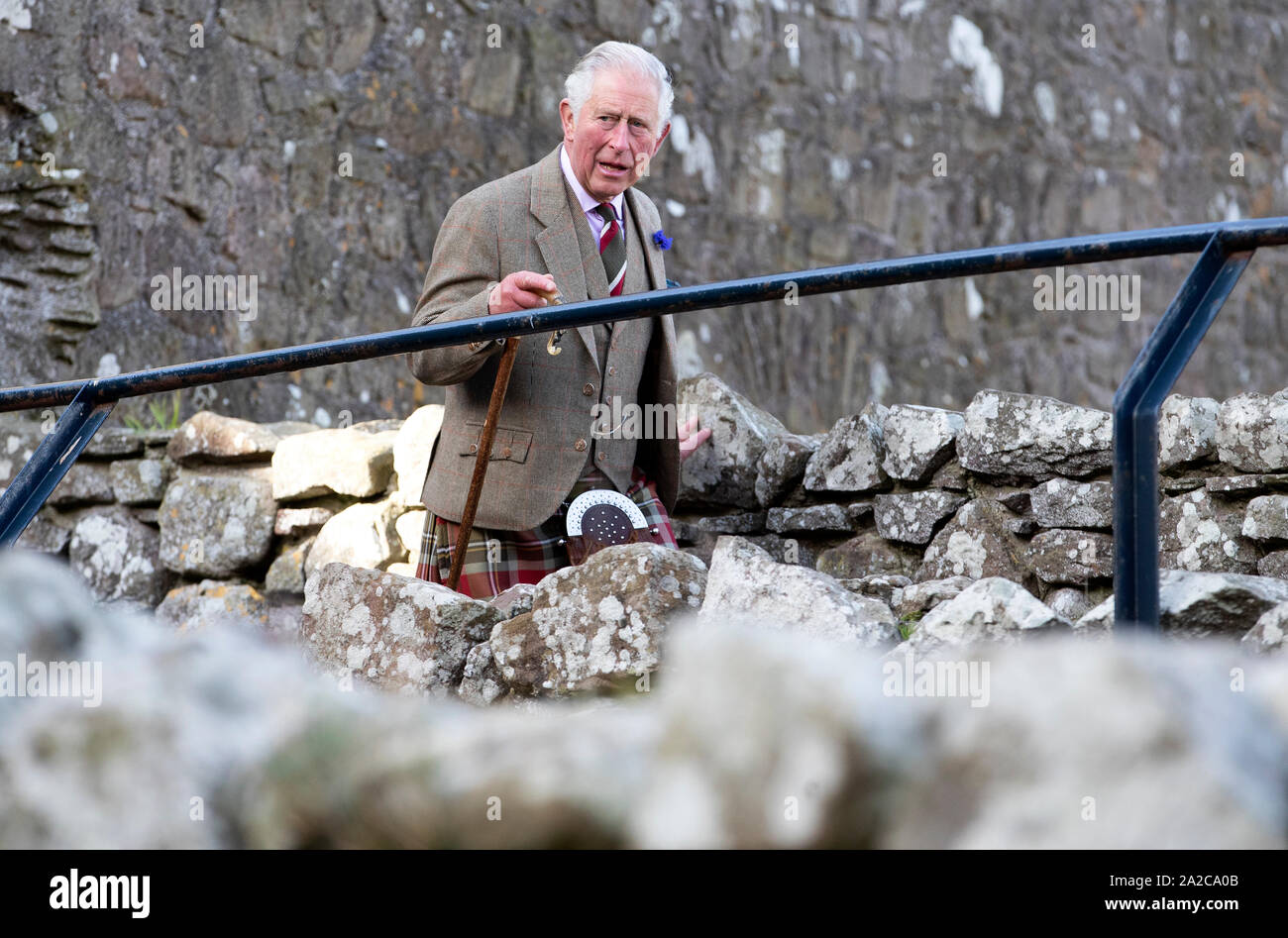 The Prince of Wales, known as the Duke of Rothesay while in Scotland, during a visit to Dunnottar Castle during a visit to Dunnottar Castle, the cliff top fortress which was once the home of the Earls Marischal, near Stonehaven. Stock Photo