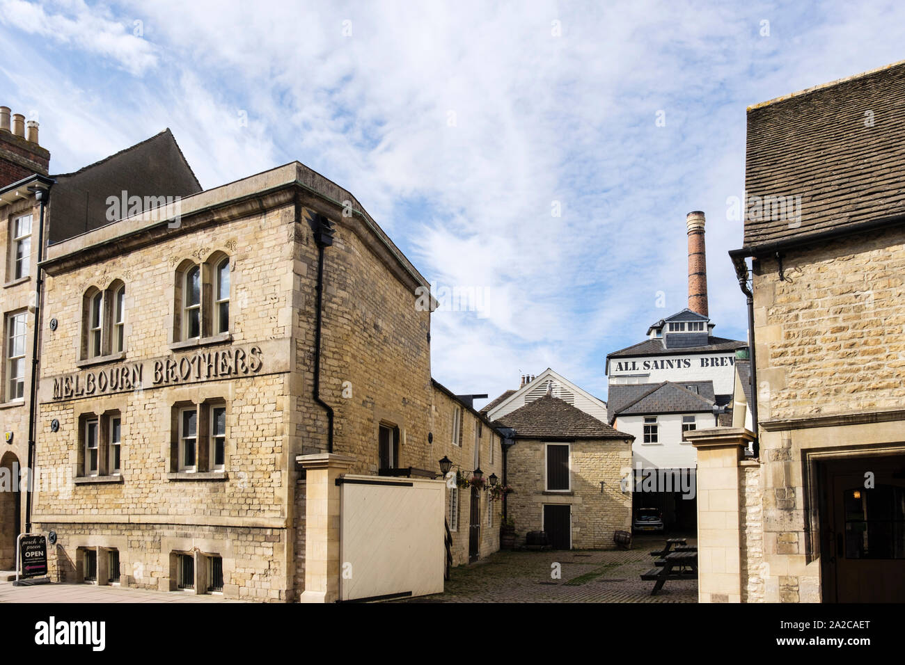 Melbourn Bros’ All Saints Brewery 1825 and pub in old limestone buildings. Stamford, Lincolnshire, England, UK, Britain Stock Photo