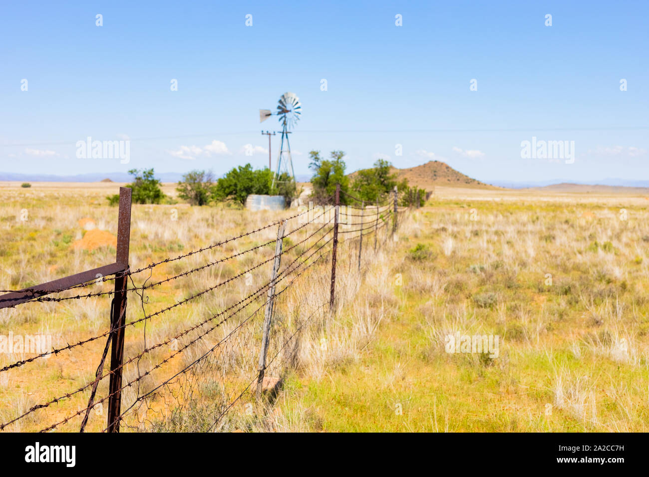 Windmill Windpump on a farm in rural grassland area of South Africa ...
