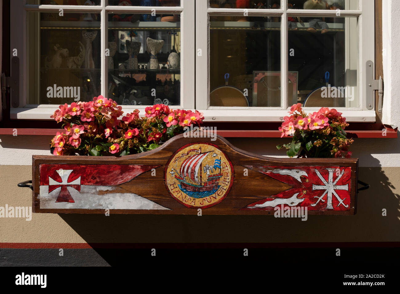 Close up of souvenir shop window with wooden flower  box, Tallinn, Estonia Stock Photo