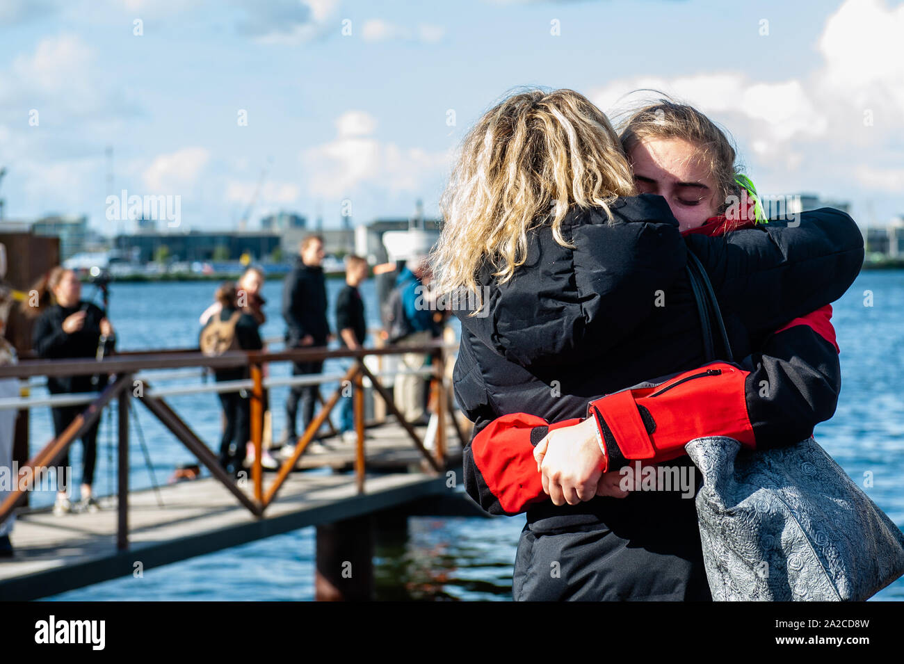 Belgian climate activist, Adélaïde Charlier is seen  saying goodbye to her mother before departing.From the NDSM Wharf in Amsterdam, 36 climate activists are sailing out to go to the UN Climate Conference in Santiago, Chile. Between them, there is Anuna de Weber, who is the organizer of the Climate Strikes in Belgium and Adélaïde Charlier, French-speaking coordinator for the 'Youth for climate' movement. Their mission as Greta Thunberg already did, is decrease the climate impact of traveling. They will be sailing for around 7 weeks to Rio de Janeiro, and from there they will travel by bus. Stock Photo