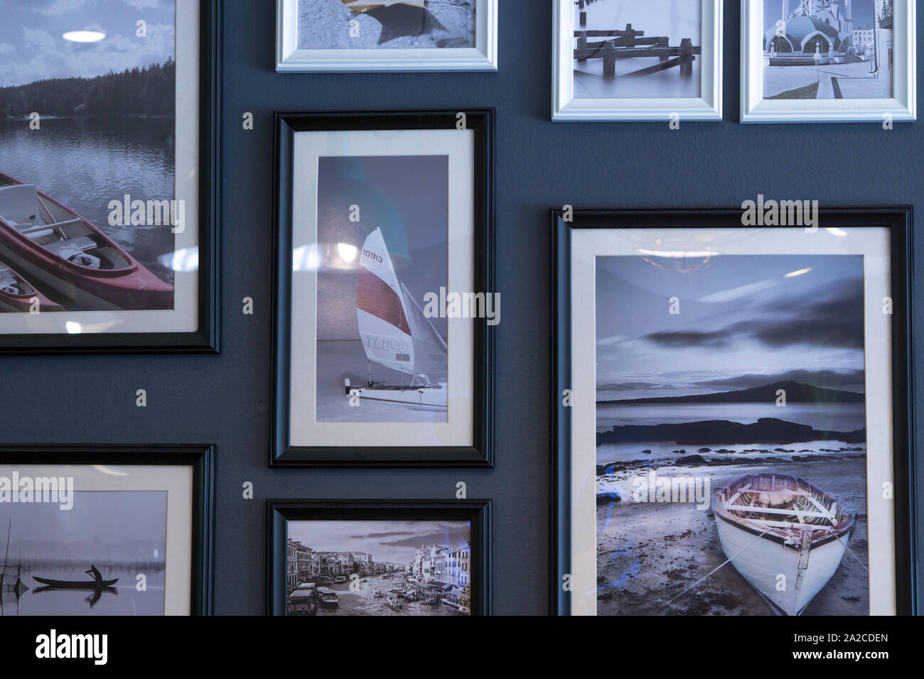 Ship picture frame on the black concrete wall. Background, home decoration Stock Photo Alamy