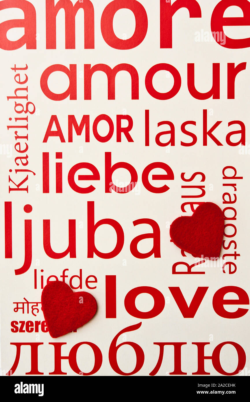 love written in many languages and two heart shapes Stock Photo