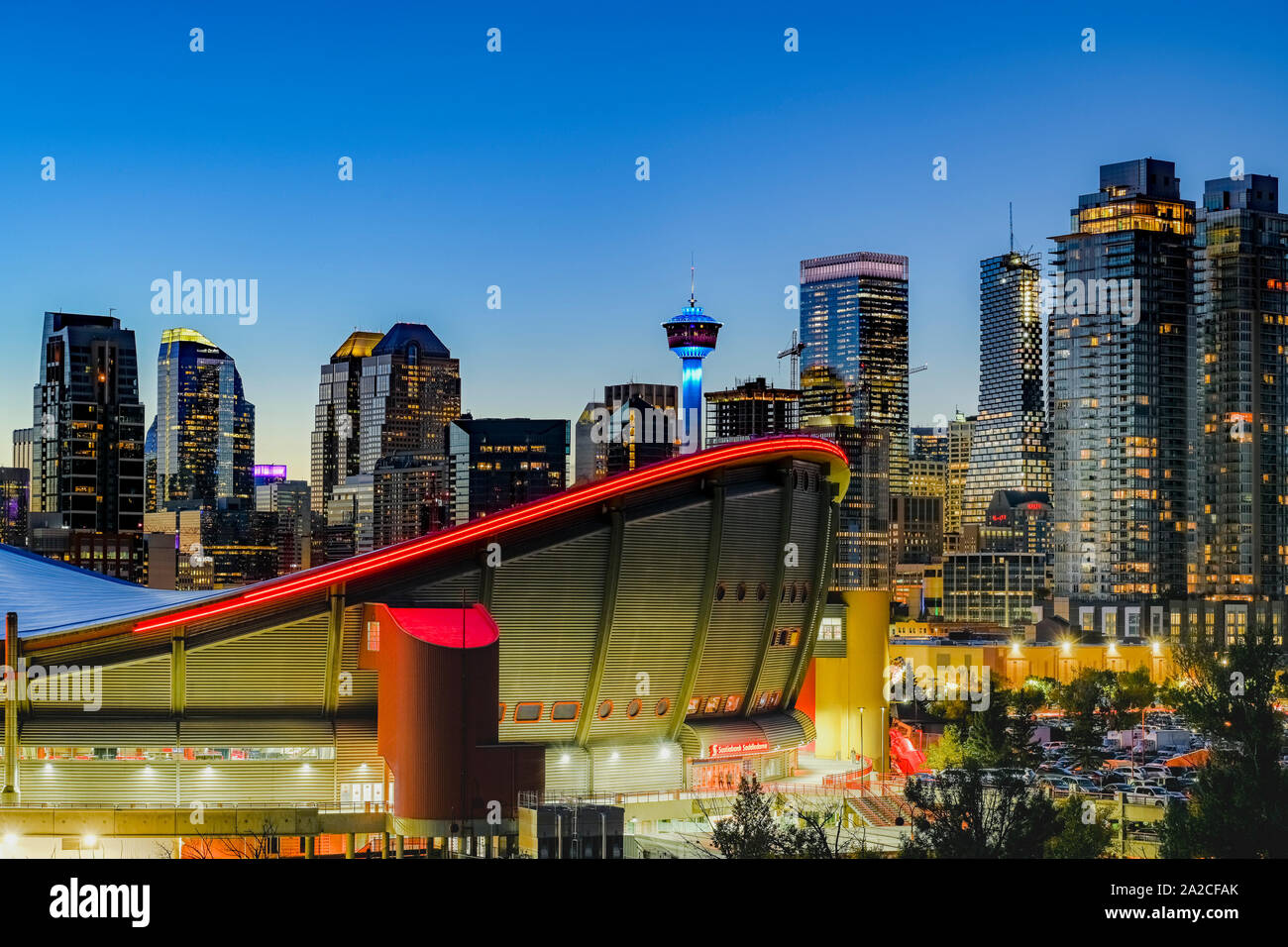 Saddledome and downtown skyline, Alberta, Canada Stock Photo