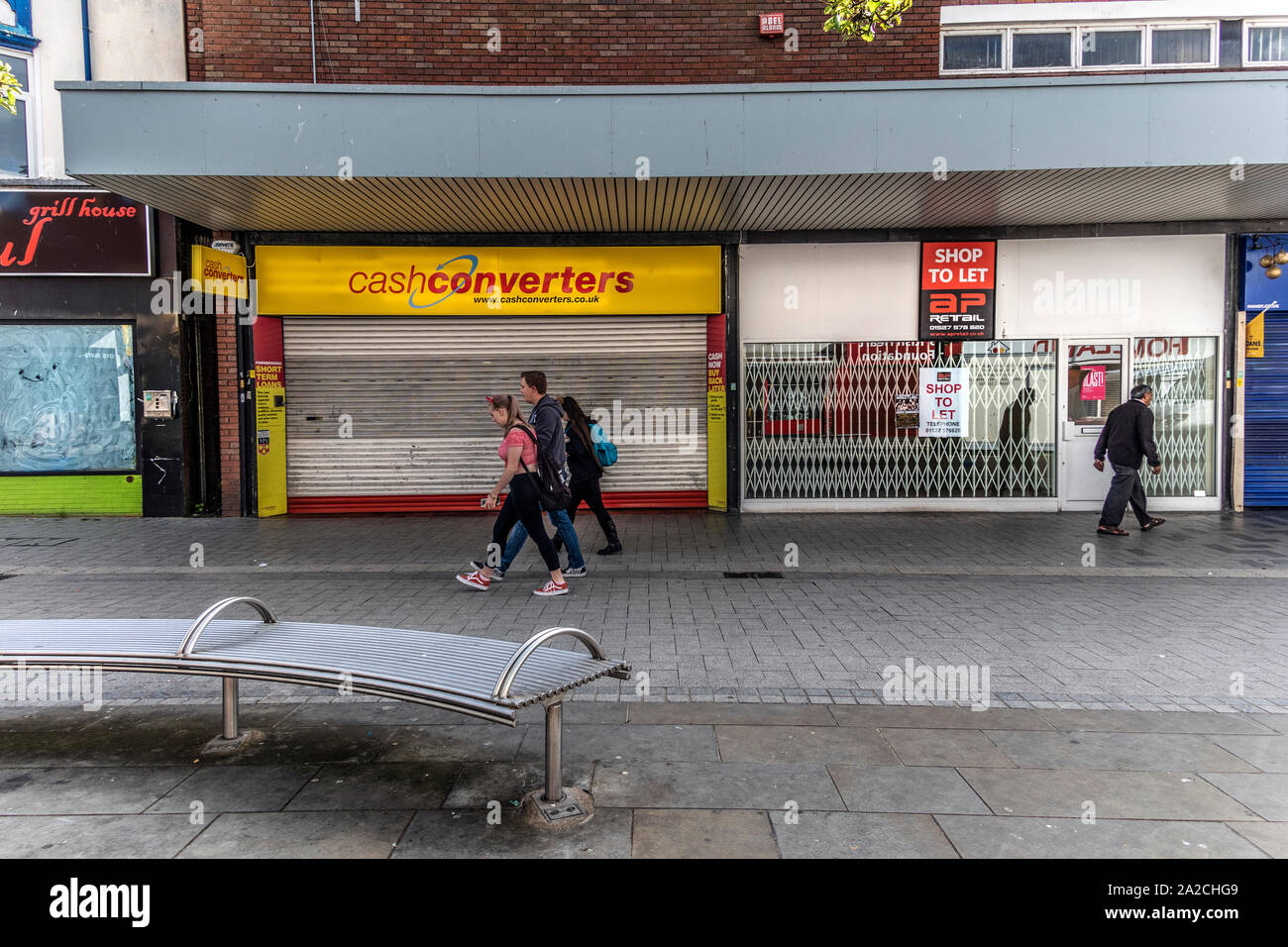 Closed shops on the High Street, Cash converters, West Bromwich, West Midlands, UK. Stock Photo