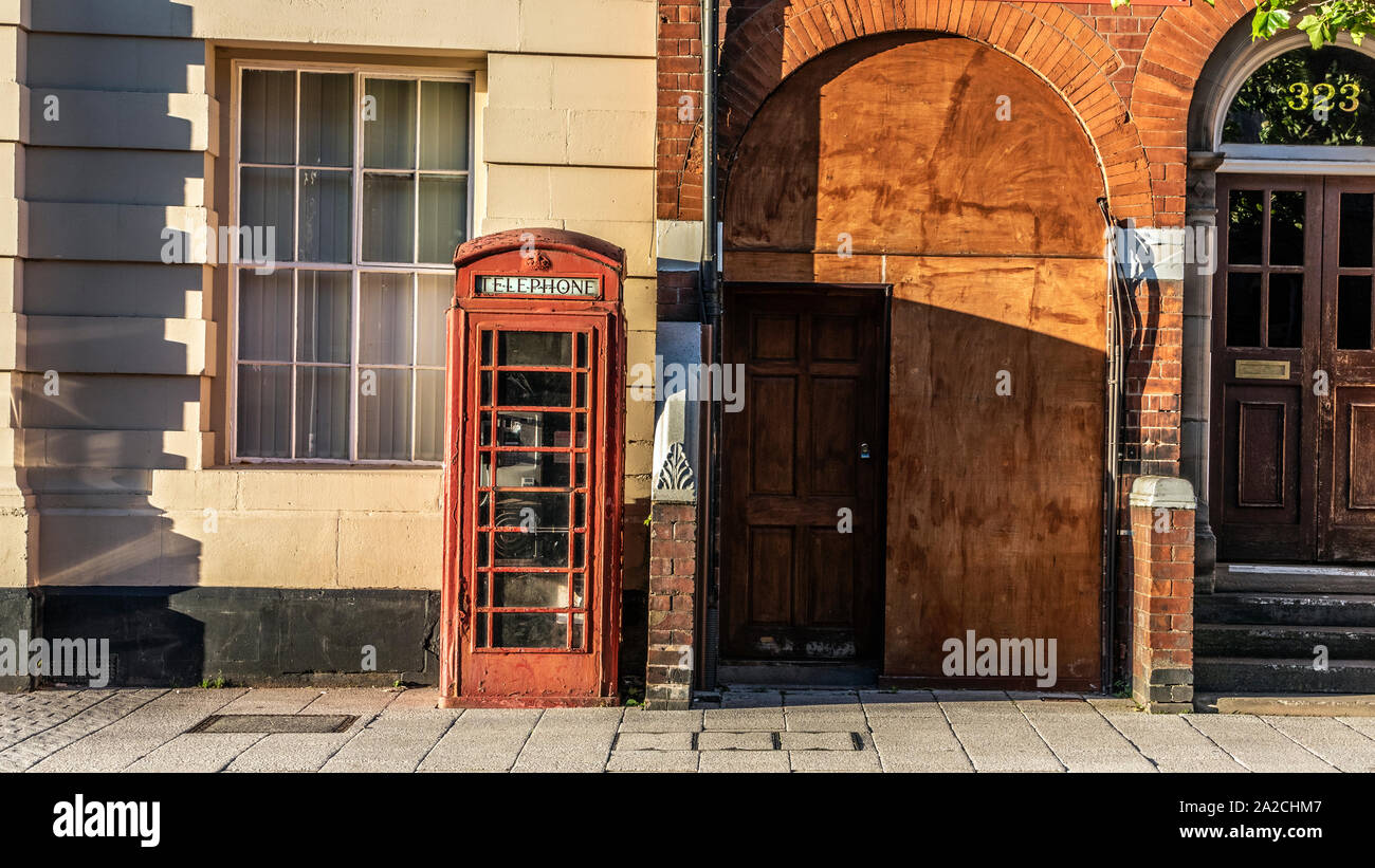 Old fashioned red telephone box. West Bromwich, West Midlands, UK. Stock Photo
