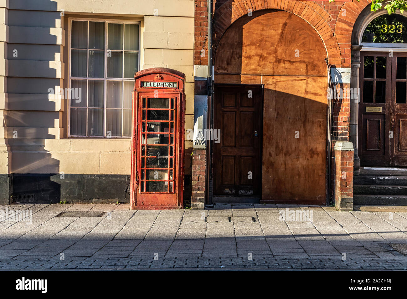 Old fashioned red telephone box. West Bromwich, West Midlands, UK. Stock Photo